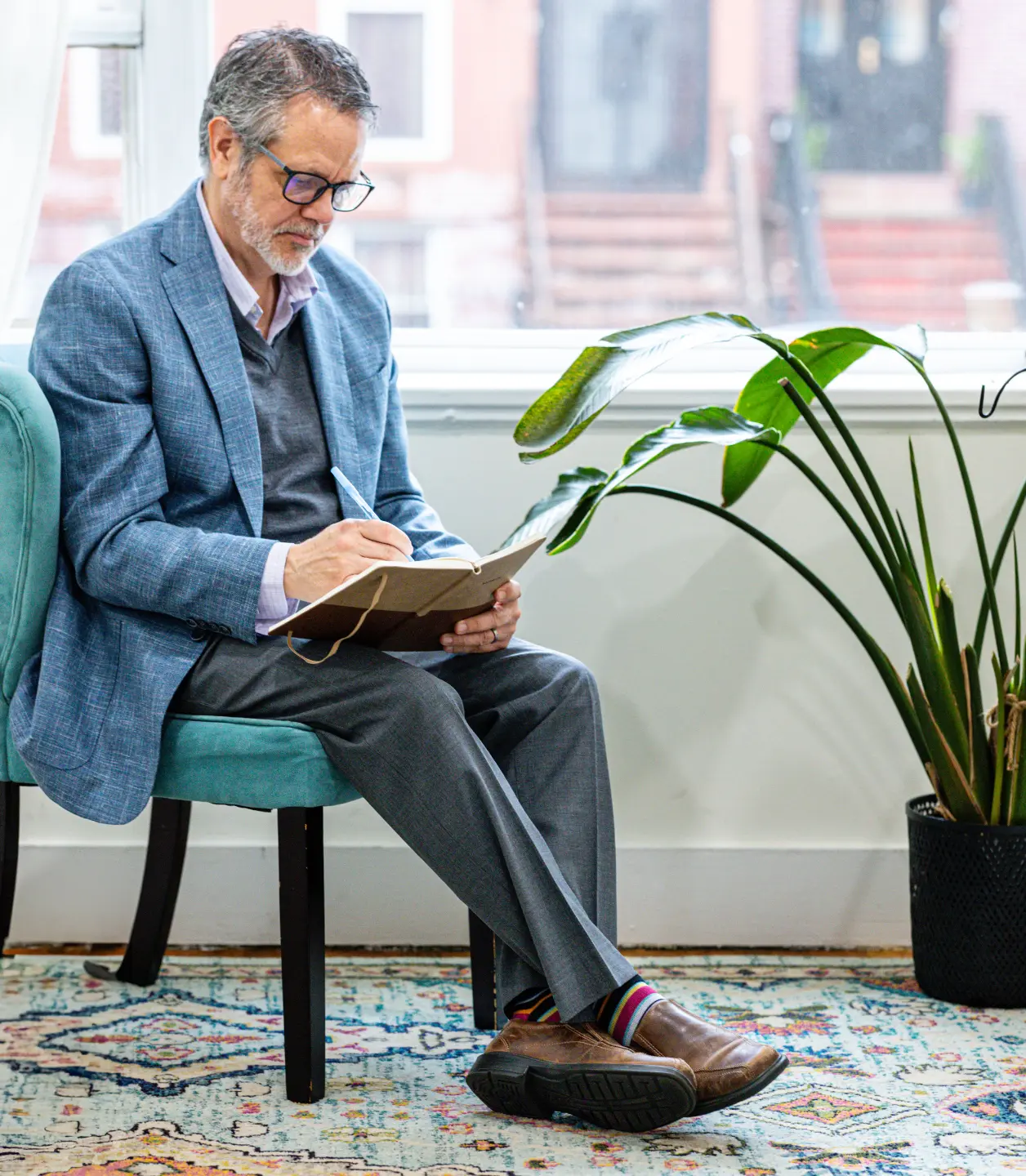 chris writing on his diary